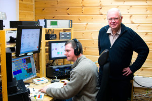Michael G7VJR operating OH8X with Olof G0CKV standing, right